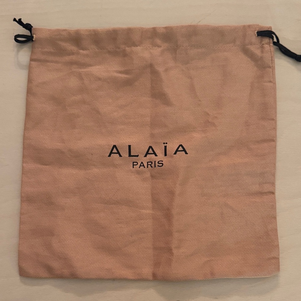 Alaia Tan Drawstring Bag